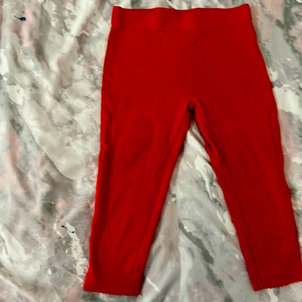 Red lace on the bottom of the leggings